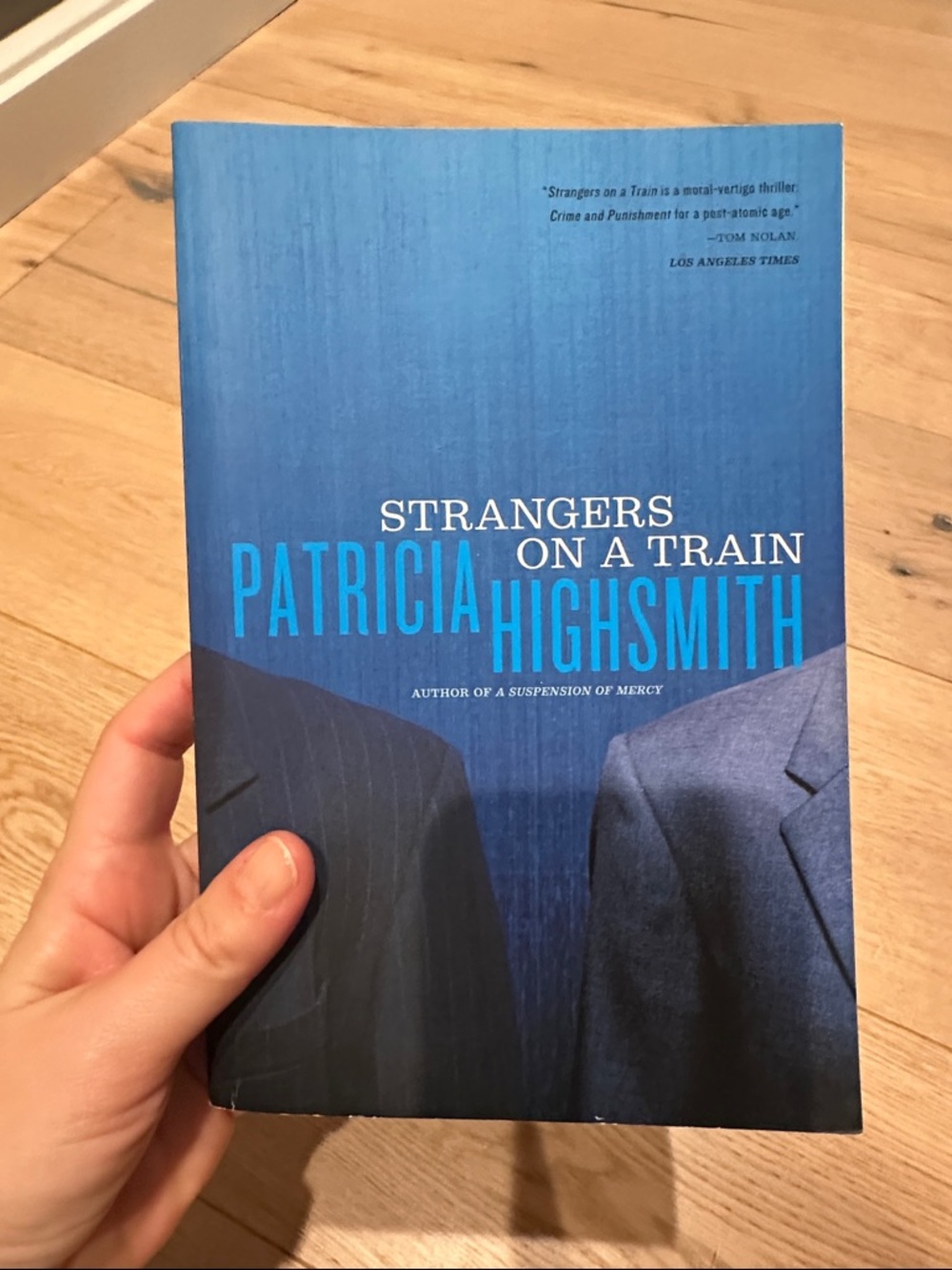 Strangers on a Train by Patricia Highsmith - Blue Cover
